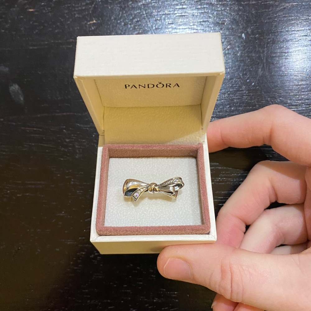 Brand new in box Pandora bow ring. Size 6.